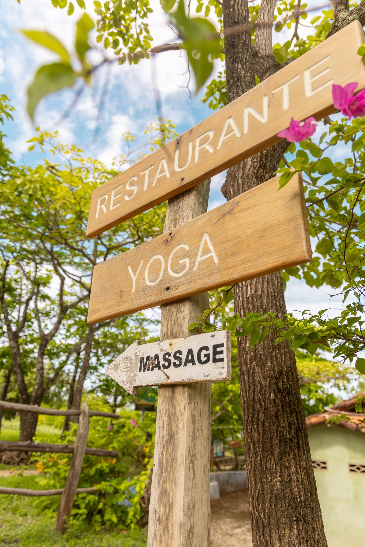 Signs to yoga and massage, minutes from the gate